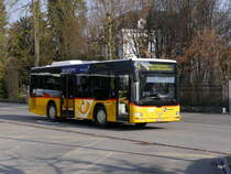 Postauto - MAN AG 347014 unterwegs beim Bahnhof Wohlen am 11.03.2016