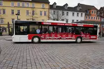 Ein für Media-Markt werbender MAN Lion's City (Nr. 143) der SÜC, unterwegs als Linie 1A (Lauterer Höhe/OBI - Hasenstein), am 21.3.2016 bei der Haltestelle Theaterplatz.
