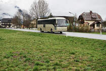 Temsa Safari von POSTBUS unterwegs als SEV-Kurs 14228 (Lienz Bahnhof - Greifenburg-Weißensee Bahnhof), am 9.4.2016 nahe der Haltestelle Greifenburg-Weißensee Bahnhof.