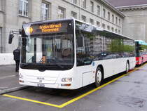 Postauto - MAN Lion`s City BE 88323 unterwegs als Bahnersatz vor dem Bahnhof in Biel am 23.04.2016
