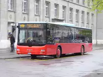 Postauto - MAN Lion`s City BE 424202 unterwegs als Bahnersatz vor dem Bahnhof in Biel am 23.04.2016