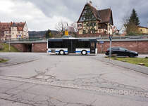 Neoplan Centroliner von Ehrlich Touristik, unterwegs als Linie 98 (Amorbach Bahnhof - Beuchen Bushaltestelle - Amorbach Bahnhof), am 23.3.2016 nahe der Haltestelle Amorbach Bahnhof.