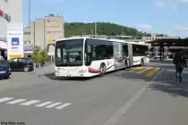 Postauto/ PU Twerenbold Nr. 22 (Mercedes CitaroII O530G) am 11.5.2016 beim Bhf. Baden-West. Die Postautos verkehren bei Ankunft in Baden zur Haltestelle Bahnhof West und lassen dort die Passagiere aussteigen bevor sie zum Postauto-Terminal auf der anderen Seite des Bahnhofs fahren.