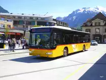 Postauto - Mercedes Citaro  BE  610539 bei den Bushaltestellen vor dem Bahnhof in Interlaken West am 06.05.2016