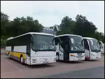 MAN ÜL 353 der Verkehrsbetriebe Teltow-Fläming und Setra 415 GT-HD von Stewa aus Deutschland und Scania Irizar von Hübner aus Deutschland im Stadthafen Sassnitz am 31.05.2014