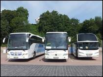Mercedes Tourismo von Reese Reisen aus Deutschland und Mrcedes Tourismo von Alka Reisen aus Deutschland un Neoplan Cityliner von Kylltal Reisen aus Deutschland im Stadthafen Sassnitz am 08.06.2014