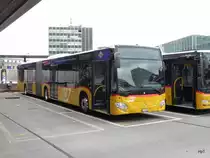 Postauto - Mercedes Citaro  BE 734634 am warten auf den Nächsten Einsatz bei den Postautohaltestellen auf dem Dach des Bahnhofs Bern am 21.06.2016