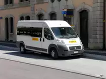 Postauto / PubliCar - Fiat  JU 69131 vor dem Bahnhof in Delemont am 09.07.2016