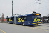 Solaris Bus der Post auf der Linie 84, wartet beim Bahnhof Kaiseraugst die nächste Abfahrtszeit ab. Die Aufnahme stammt vom 10.02.2017.