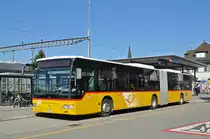 Mercedes Citaro der Post auf der Linie 84, wartet beim Bahnhof Kaiseraugst die nächste Abfahrtszeit ab. Die Aufnahme stammt vom 10.03.2017.