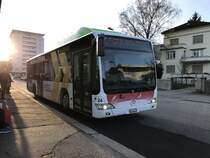 Citaro Nr. 24 mit Vollwerbung für den Libero Tarifverbund  am 10.3.17 beim warten auf die Abfahrt beim Bhf Grenchen Süd.