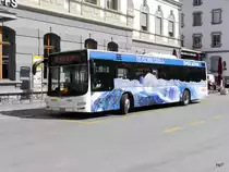 Postauto / Ortsbus Brig - MAN Lion`s City  VS  449116 vor dem Bahnhof in Brig am 01.04.2017