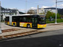 Postauto - MAN Lion`s City  SO  156795 bei der Zufahrt zum Bahnhof von Oensingen am 13.04.2017