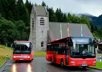 An der Haltestelle Spitzingsee Kirche treffen sich am 12.09.2017 die RVO-Linien 9560 (MAN Lion's City M M-RV 3884) zur Moni-Alm und 9562 (Setra S 415 UL M-RV 2763) nach Schliersee
