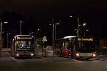 Wiener Linien NL220MB 8204 auf der Linie 27A und ÖBB-Postbus NL313 14106 auf der Linie 94A in Kagran, 12.12.2017