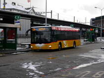 Postauto - MAN Lion`s City  SO 108085 unterwegs vor dem Bahnhof in Olten am 09.12.2017