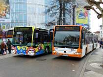RNV Mercedes Benz Citaro 1 G Wagen 8169 Kunstbus und Citaro 1 Facelift Wagen 8182 am 16.12.17 in Heidelberg Bismarckplatz