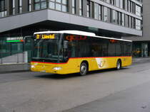Postauto - Mercedes Citaro  BL  20038 bei den Bushaltestellen vor dem Bahnhof in Liestal am 23.12.2017