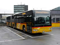 Postauto - Mercedes Citaro BE 83880 bei den Postauto Haltestellen auf den Dach des SBB Bahnhof Bern am 06.01.2017