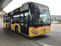 MB C2 K  '10169'  BE 653 383  von PostAuto auf der Linie 65 nach Faulensee, am 14.4.18 beim Bhf Spiez.