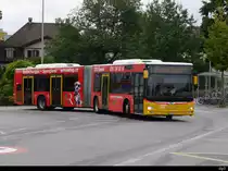 Postauto - MAN Lion`s City  BE  88931 mit Werbung unterwegs in Lyss am 21.07.2018