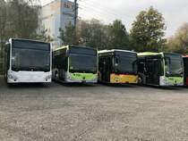 Ein weiterer MB C2 K Hybrid zwischen dem Weissen und PostAuto C2 am 20.10.18 bei Evobus in Kloten.