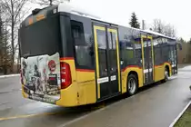 Heck des PostAuto MB C2 K 348 vom PU Rolf Stutz der am 9.2.19 beim Bhf Uitikon-Waldegg steht.