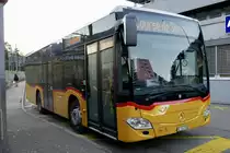 PostAuto MB C2 K vom PU Tobler, Rebeuvelier der am 15.2.19 vor dem Bahnhof Moutier steht.