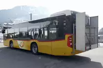 Das Heck des PostAuto MB C2 K '10364' des PU TPC, Aigle am 23.2.19 beim Bahnhof Le Sépey.