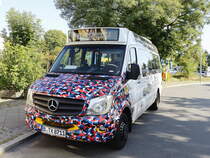 Frontpartie mit dem Muster von den Sitzen der Berliner U-Bahn eines Mercedes Sprinter City am 23. August 2019 nahe dem U-Bahnhof Berlin Rudow. 