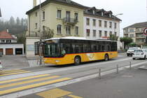 Postauto/Regie Porrentruy JU 23356 (Mercedes Citaro Facelift O530Ü) am 22.10.2019 beim Bhf. Porrentruy