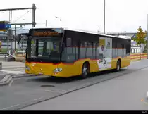 Postauto - Mercedes Citaro  JU  43871 bei Bahnhof Delemont am 09.11.2019