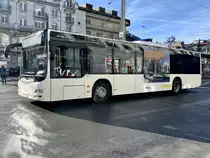 Ortsbus Brig-Glis MAN Lion's City '10444'  VS 449 116' neu mit Eigenwerbung für eine frühere Verbindung ab Fahrplanwechsel, am 8.12.19 auf dem Bahnhofplatz Brig.