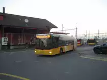 Postauto/PU Schuler SZ 69121 (MAN A21 Lion's City) am 3.12.2019 beim Bhf. Pfäffikon SZ