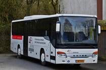 AB 2010 Setra S 415 UL der Fahrschule Bormann, geshen auf einem Parkplatz am 14.12.2019.