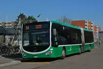 Wärend der Grossbaustelle zwischen Muttenz und Pratteln werden Busse als Tram Ersatz eingesetzt. Hier wartet der Mercedes Citaro 7006, auf der Linie 14, an der Endstation an der Rothausstrasse. Die Aufnahme stammt vom 24.03.2020.