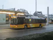 Postauto/Regie Hausen a.A. Nr.338 (MAN A21 Lion's City) am 10.12.2020 beim Bhf. Affoltern am Albis