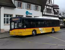 Postauto - Solaris BL 205702 bei den Haltestellen vor dem Bahnhof von Rheinfelden am 31.01.2021