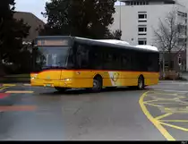 Postauto - Solaris BL 205709 bei der Zufahrt zu den Haltestellen vor dem Bahnhof von Rheinfelden am 31.01.2021