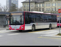 travys - MAN Lion`s City  VD  1110 bei den Bushaltestellen vor dem Bahnhof in Yverdon les Bains am 13.02.2021