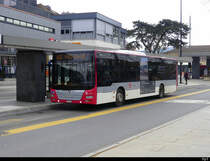 travys - MAN Lion`s City VD 133031 bei den Bushaltestellen vor dem Bahnhof in Yverdon les Bains am 13.02.2021