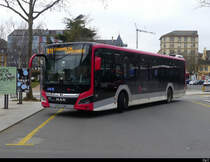 travys - MAN Lion`s City VD 289243 bei den Bushaltestellen vor dem Bahnhof in Yverdon les Bains am 13.02.2021
