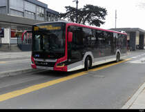 travys - MAN Lion`s City VD 289243 bei den Bushaltestellen vor dem Bahnhof in Yverdon les Bains am 13.02.2021