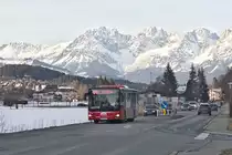 MAN Niederflurbus 3. Generation (Lion's City) von Postbus (BD-14091) als linie 4010 in Kitzbühel, Jochberger Straße. Aufgenommen 4.2.2021.
