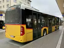 Heckansicht des MB C2 K '10260' von PostAuto am 16.3.21 in Delemont.