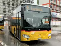 PostAuto MB C2 K hybrid '11186'  JU 46213  am 16.3.21 beim Bahnhof Delemont.