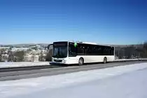 Bus Schwarzenberg / Bus Grünhain-Beierfeld / Bus Erzgebirge: MAN Lion's City Ü der RVE (Regionalverkehr Erzgebirge GmbH), aufgenommen im Februar 2021 im Stadtgebiet von Grünhain-Beierfeld.