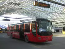 Postauto/Regie Chur Nr. 94 ''Bernina-Express'' (MAN R12 Lion's Regio) am 4.2.2021 beim Bhf. Chur. Wenn der Bernina-Express Bus zwischen Tirano und Lugano nicht fährt, kommt das rote Postauto ab Chur zum Einsatz. Hier auf der Linie 171 über den San Bernadino nach Bellinzona. Corona bedingt könnte der Einsatz des BEX-Buses wohl noch längere Zeit in Chur sein.
