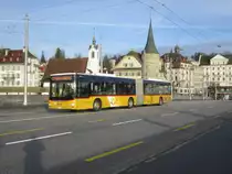 Postauto/PU Bucheli Nr. 20 (MAN A23 Lion's City G) am 5.2.2021 zwischen dem Schwanenplatz und dem Bahnhof Luzern