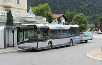 Ötztal - 27. August 2021 : Einer der neue Solaris Urbino 12 IV steht mit einem Fahrrad Anhänger am Bahnhof Ötztal.